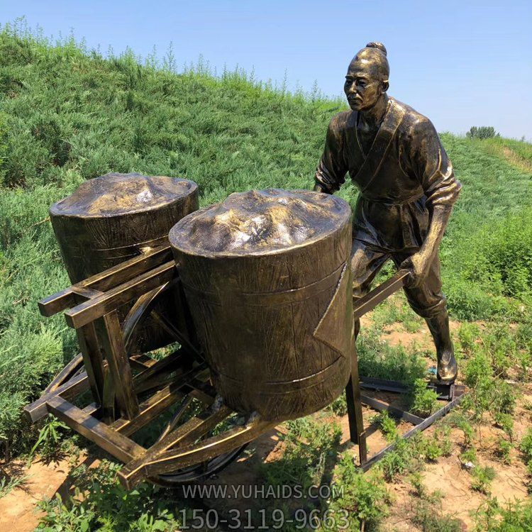 用獨(dú)輪車(chē)運(yùn)糧食的農(nóng)民雕塑