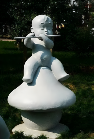 公園戶外石雕景觀吹笛子的兒童雕塑